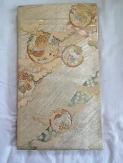 袋帯（六通）オレンジゴールド系花蝶模様