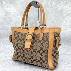 COACH シグネチャー ハンドバッグ タッセル付き COACH シグネチャー ハンドバッグ タッセル付き - メルカリ