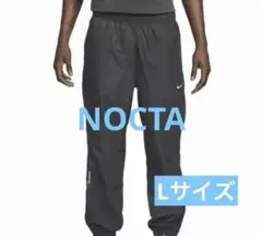 ナイキ ドレイク ノクタ ノーススター ナイロントラックパンツ アンスラサイト