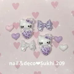 スピード発送！ヒョウ柄キティ　リボン色変更可 ネイルパーツ8個セットNo.209