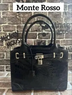 モンテロッソ クロコ型押し エナメル ハンドバッグ