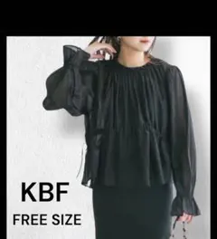 KBF ウエストギャザリングシアーブラウス リボン 長袖 ブラック カットソーのサムネイル
