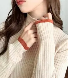 オレンジニット