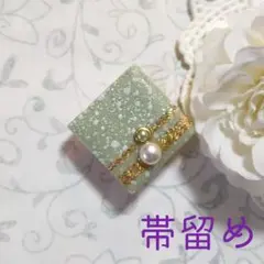 [No.717]レトロタイルに金色ライン帯留め