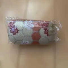 オレンジとゴールドの印鑑入れなどの小物ケース