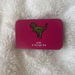 COACH ピンク 恐竜 缶ケース