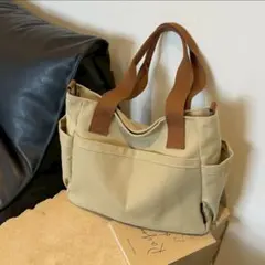 カーキ 大容量　ショルダーバッグ 帆布 多ポケット 旅行　通学　トートバッグ