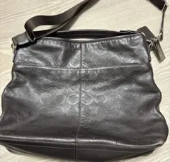 コーチのオプアート柄の2WAYショルダーバッグ ダークブラウン