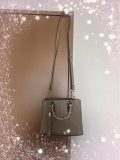 グレー ショルダーバッグ タッセル付き