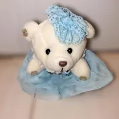 水色のドレスを着たクマのぬいぐるみ