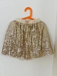 H &M 女の子　ゴールドスパンコールスカート　122／128