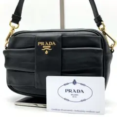 ✨美品✨プラダ ショルダーバッグ メタルロゴ リボン ゴール金具 オールレザー