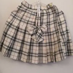 ピンクラテ　チェック柄プリーツスカート（リボン付き）