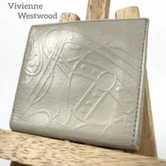 ヴィヴィアン　二つ折り財布　オーブ総柄　エンボスレザー　がま口　スクエア　美品