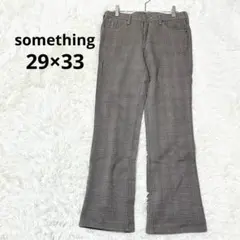 サムシング チェック柄フレアパンツ ボア ロゴ入り コットン混 可愛い ラメ糸