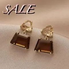 SALE⭐︎【新品未使用】幾何学的なクリスタルドロップピアス　ブラウン
