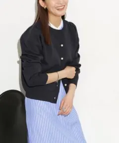 ナノユニバース　ライトスポンディッシュパールボタンカーディガン