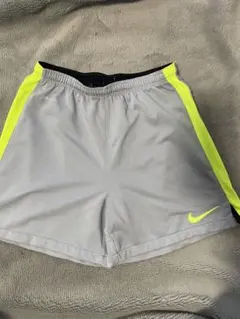 Nike Dri-FIT グレー/イエロー Sサイズ スポーツショーツ
