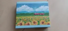 紙箱　ひまわり畑と列車