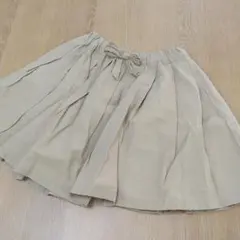 プティマイン　ベージュ フレアスカート リボン付き