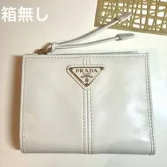 プラダ　ソフトルックスレザー 財布　ホワイト ゴールドロゴ。のサムネイル