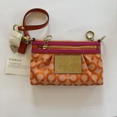 新品COACH POPPY シグネチャー リストレット ポーチ