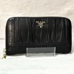 PRADA 長財布 二つ折り ギャザー ナッパレザー ブラック - メルカリ