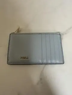 FURLA ライトブルー フラグメントケース バビロン