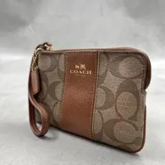 COACH シグネチャー リストレット ポーチ - メルカリ