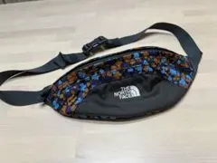 新品タグ付き・THENORTHFACE・ボディバッグ・花柄 THE NORTH FACE（花柄 ・ ボディバッグ/ウエストポーチ）の
