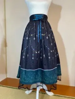axes femme 宝石柄 フレアスカート レースアップ チュール裾のサムネイル