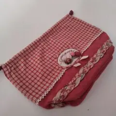 Cotton brooch 巾着袋 赤とチェック柄