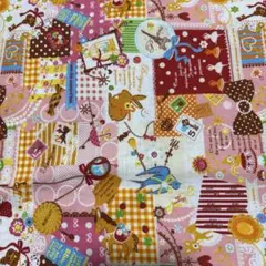 くろすろ〜ど 綿プリント生地 パッチワーク柄 ピンク/幅104cm×48cm