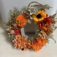 オレンジと黄色の花のリース
