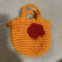 オレンジ色の花モチーフトートバッグ