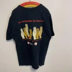WE VOLUNTEER TO DONATE Tシャツ