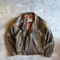 ダブルライダース レザージャケット M ブラウン 本革 斜めジップ 古着 総柄