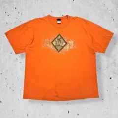 00sビンテージココペリ半袖デザインTシャツオレンジネイティブアート民族古着XL