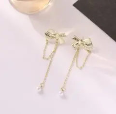 ♥️新商品♥️おしゃれ　海外　リボン　ピアス　プレゼント　ゴールド　上品　ロング