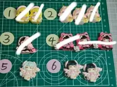 カラフルなドール型デコレーションパーツ