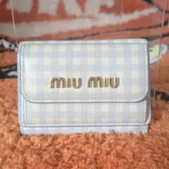MiuMiu ミュウミュウ 三つ折り財布 ギンガムチェック 水色のサムネイル