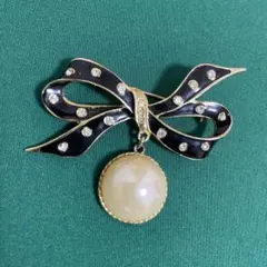 リボン形　ブラック&ゴールド　ブローチ