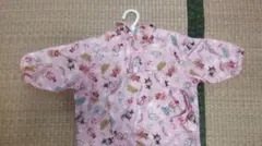 ベビーレインコート ピンク キャラクター柄