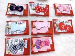 【限定】ハローキティ展 シークレット前髪クリップ りぼん　8個セット