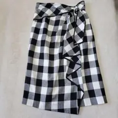 美品✨JUSGLITTY ジァスグリッティー ラップ調スカート リボン スリット