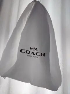 COACH ホワイト収納袋 引き紐付き