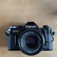 Canon A-1 ブラック 35mmフィルム一眼レフ SIGMA28-70mm - メルカリ