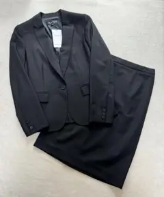 【タグ付き♡未使用品】インディヴィ　スカートスーツ　黒ストライプ織