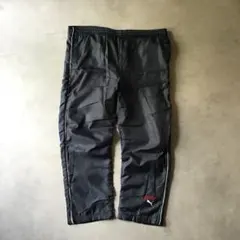 PUMA プーマ　ジャージ　シャカシャカ　ブラック　黒　裾ロゴ　裏起毛