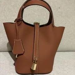 「最終値下げ！」新品未使用 本革キューブバッグ レザートートバッグ金具ゴールド